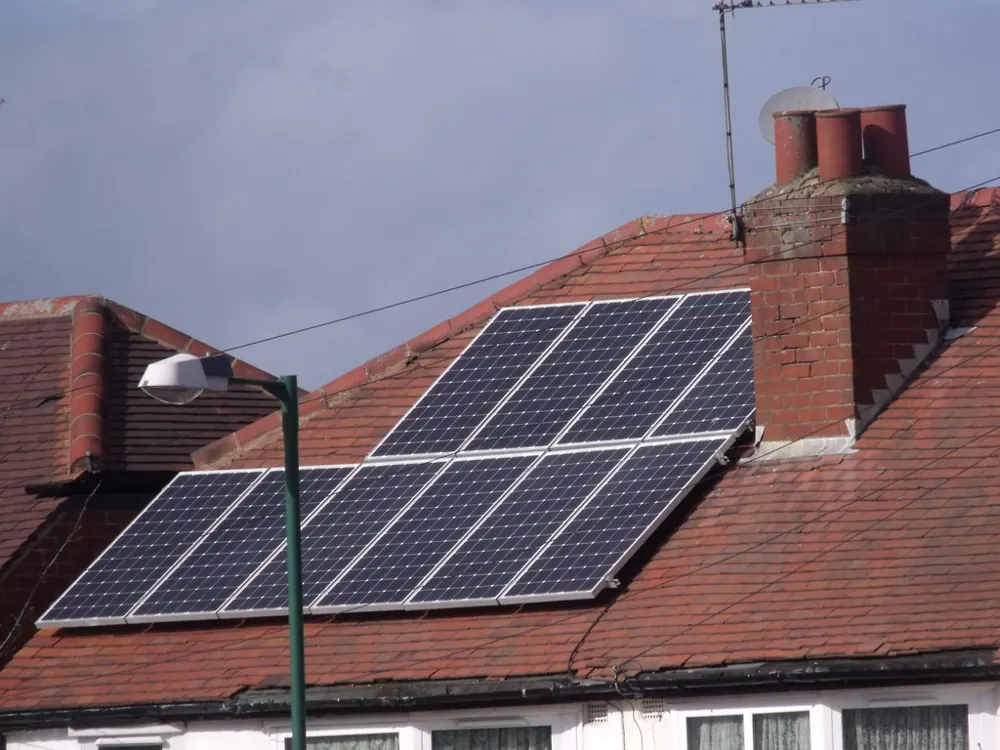 Solar panels mounted on a pitched house roof
