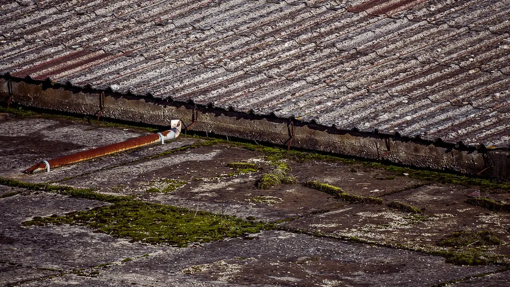 Old weathered corrugated roof on an East Rand style factory